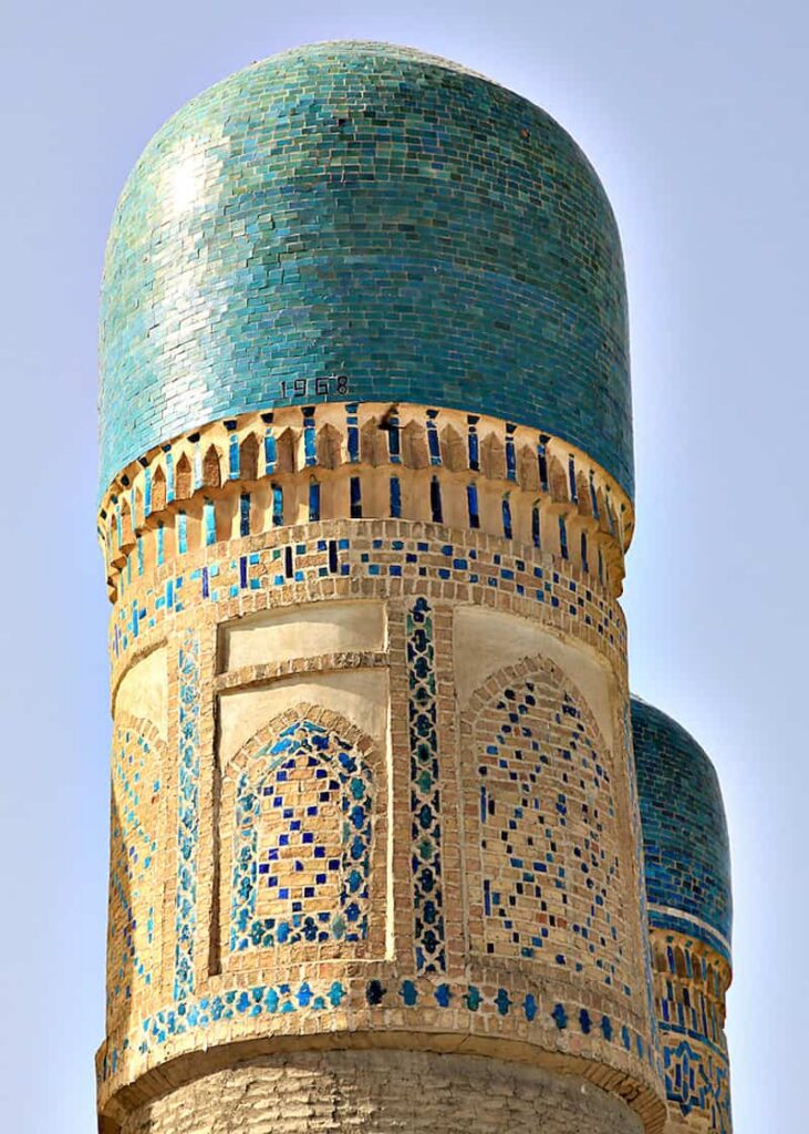 close up shot of one of the chor minor domes with its blue tiles against the clear blue sky