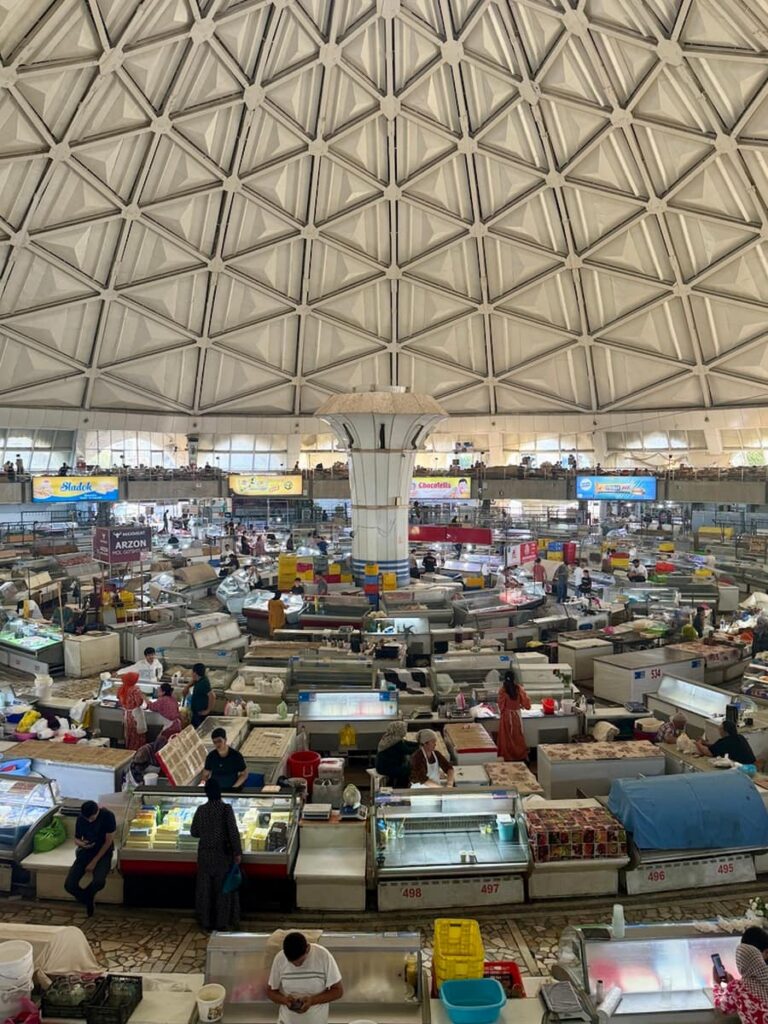 closer panoramic view of different vendors inside chorsu bazaar in tashkent