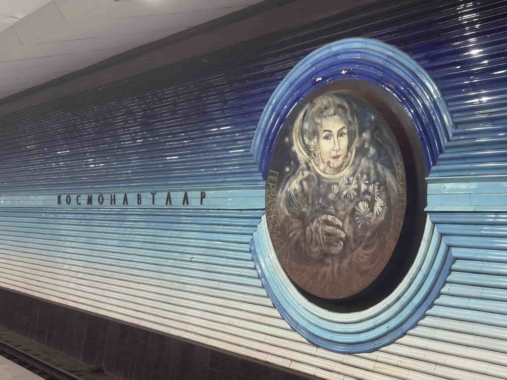 The blue ceramic Valentina Tereshkova space mosaic inside Kosmonavtlar station, featured in our Tashkent travel guide.