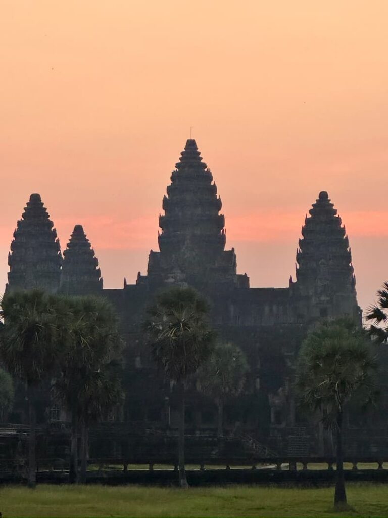 Close-up shot of the Angkor Wat temple silhouette during early morning sunrise in Cambodia. We visited it during our 2-day angkor wat tour.