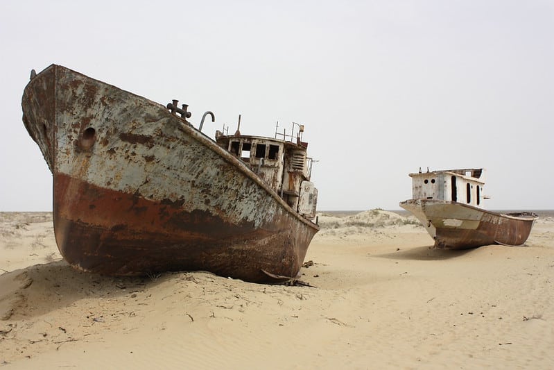 two abandonded ships at the aral sea ship graveyard far into the desert of uzbekistan