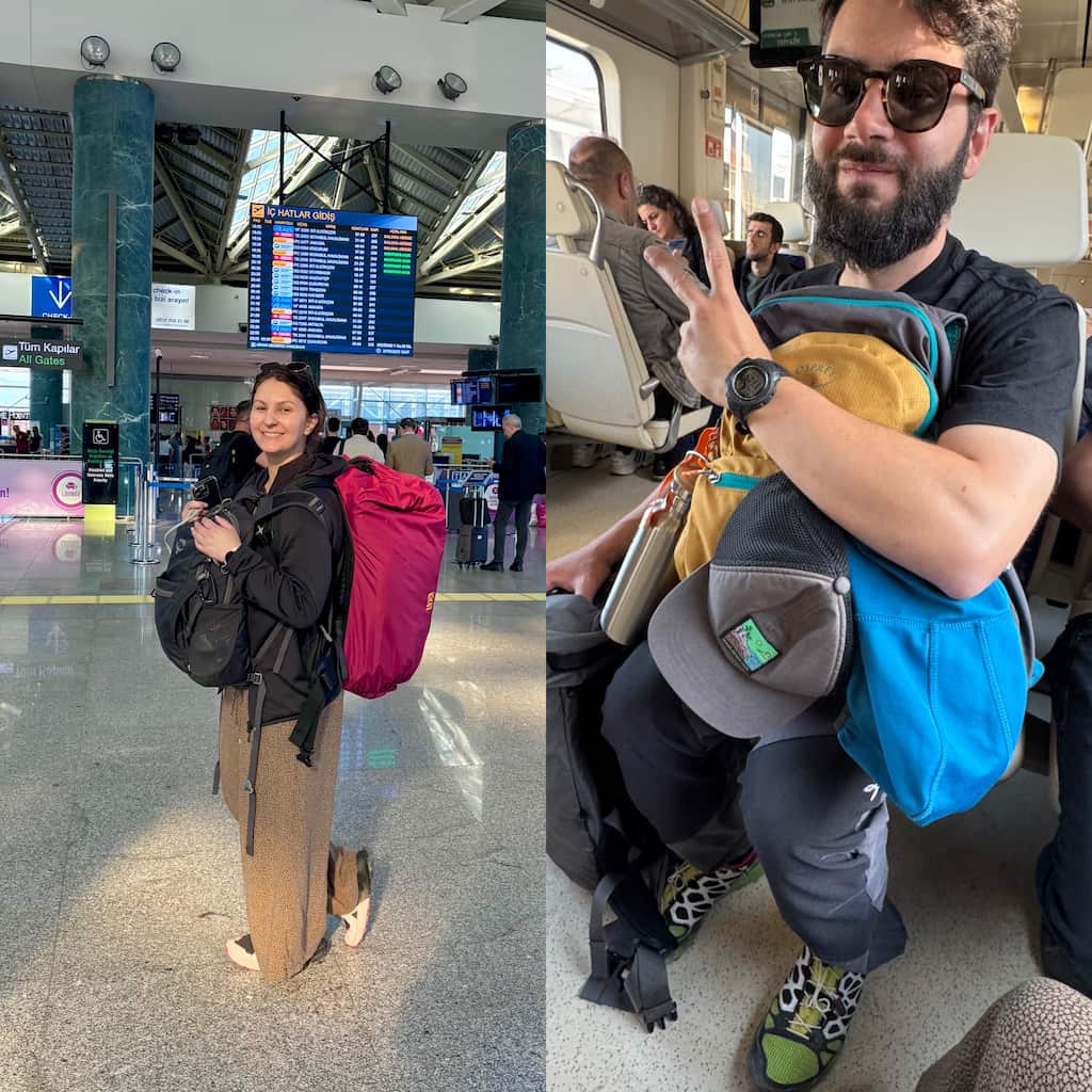 Eleni and Ale, the authors of this travel blog, carrying their backpacks on a transit day during their long-term travel