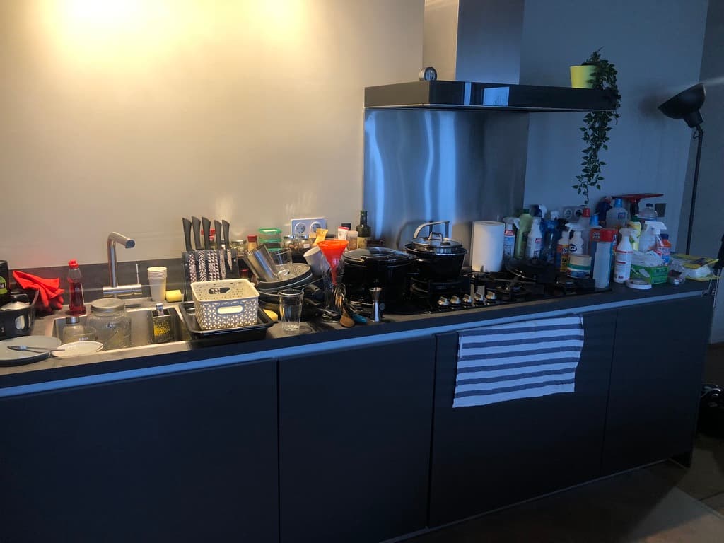 Our cluttered kitchen in Leiden, in the Netherlands, showing all the kitchen equipment we sold in order to save money for travel.