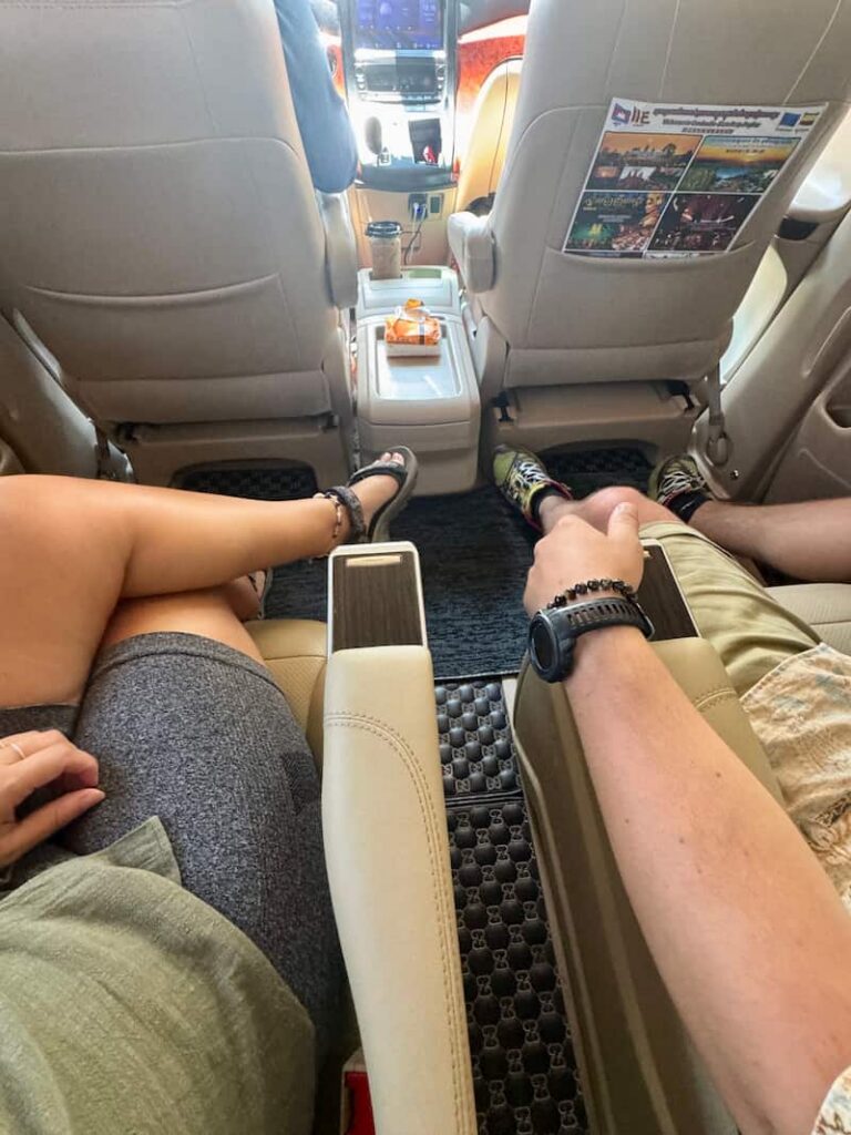 Spacious and comfortable leather seating inside a private VIP van for comfortable travel in Cambodia