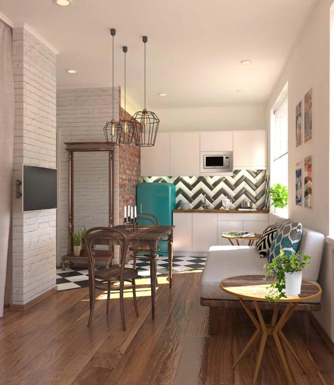 Spacious open-plan apartment interior with a modern kitchen, dining table, and cozy living space in Tashkent.