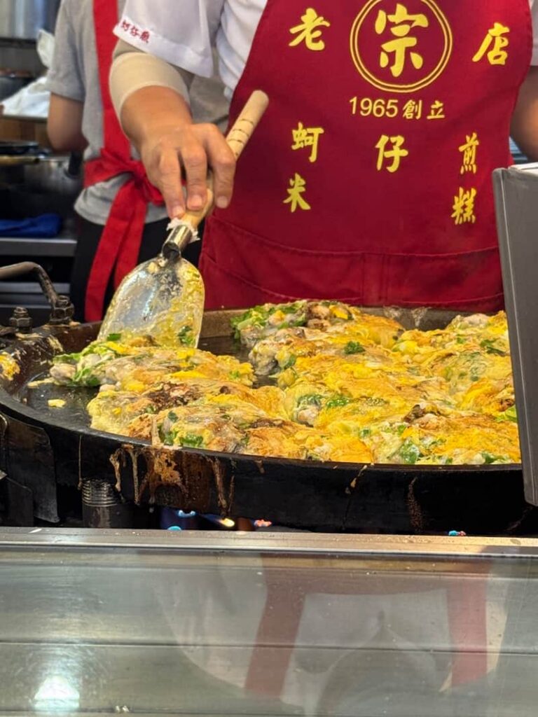 A beloved night market classic made with fresh local oysters, eggs, and leafy greens bound together by a translucent starch paste, pan-fried to a crisp finish.